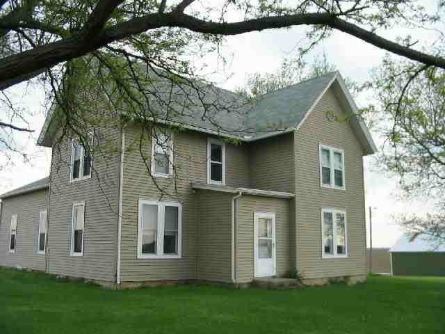 20694 Timberlake Road Chadwick, IL 61014 - Photo 2 of 9 front view of a house with a yard