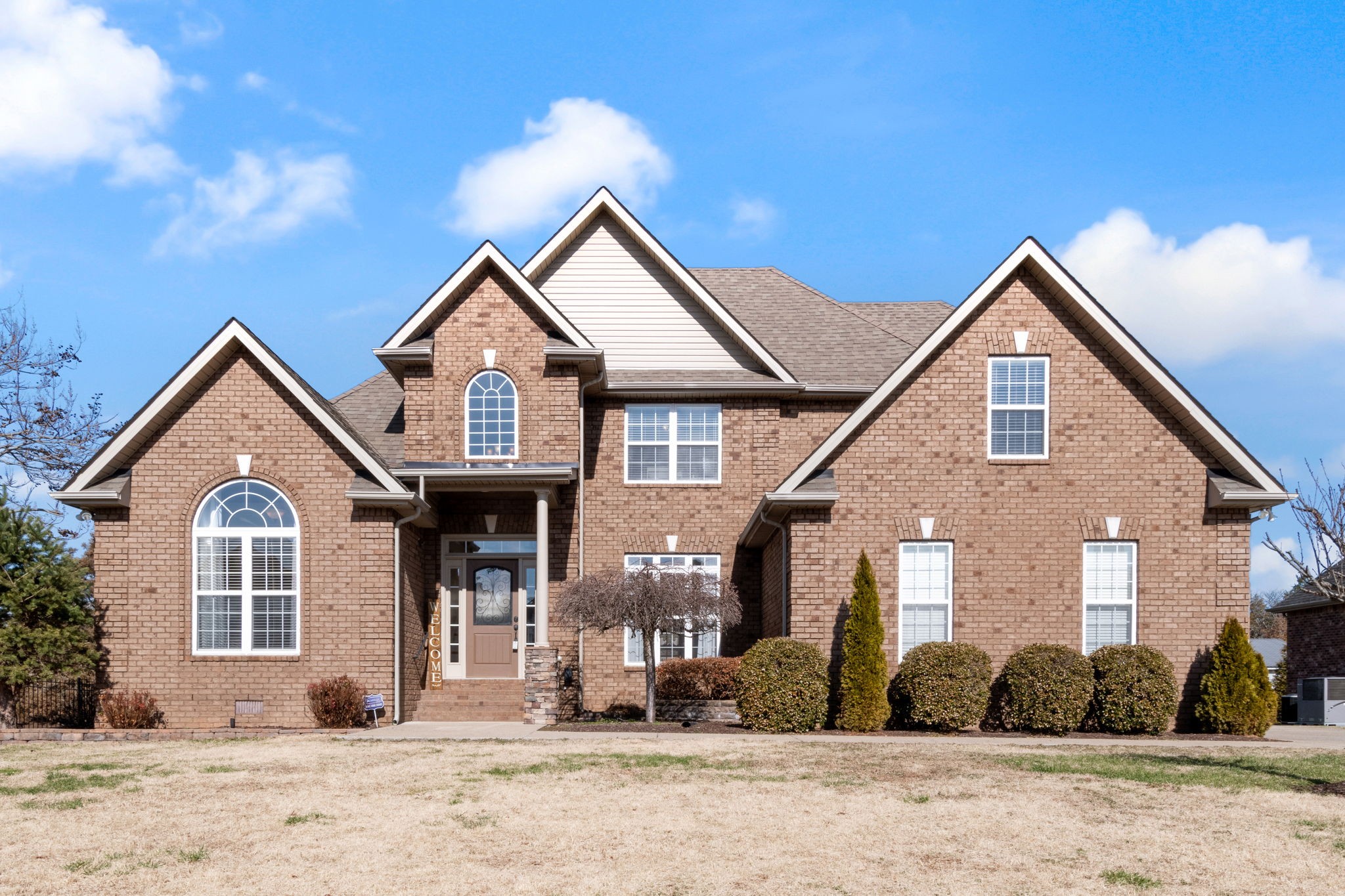 107 Mandarin Court Smyrna, TN 37167 - Photo 1 of 34 a front view of a house with a yard