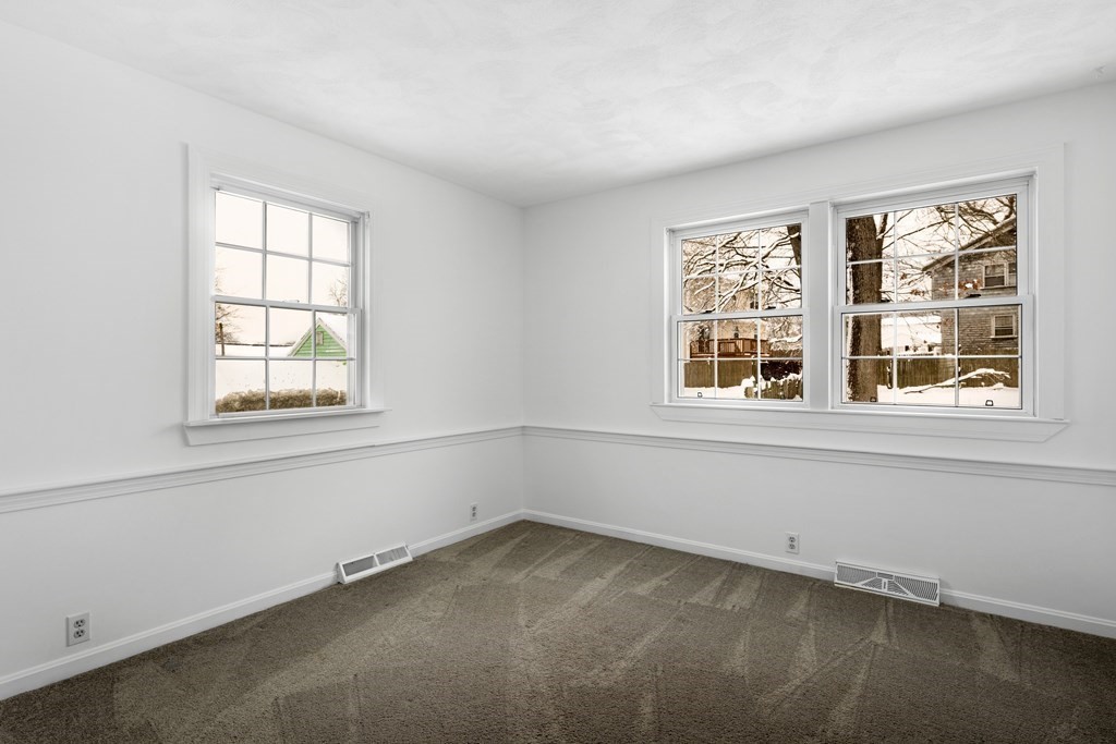 9 Fuller Road Billerica, MA 01821 - Photo 19 of 27 an empty room with a window