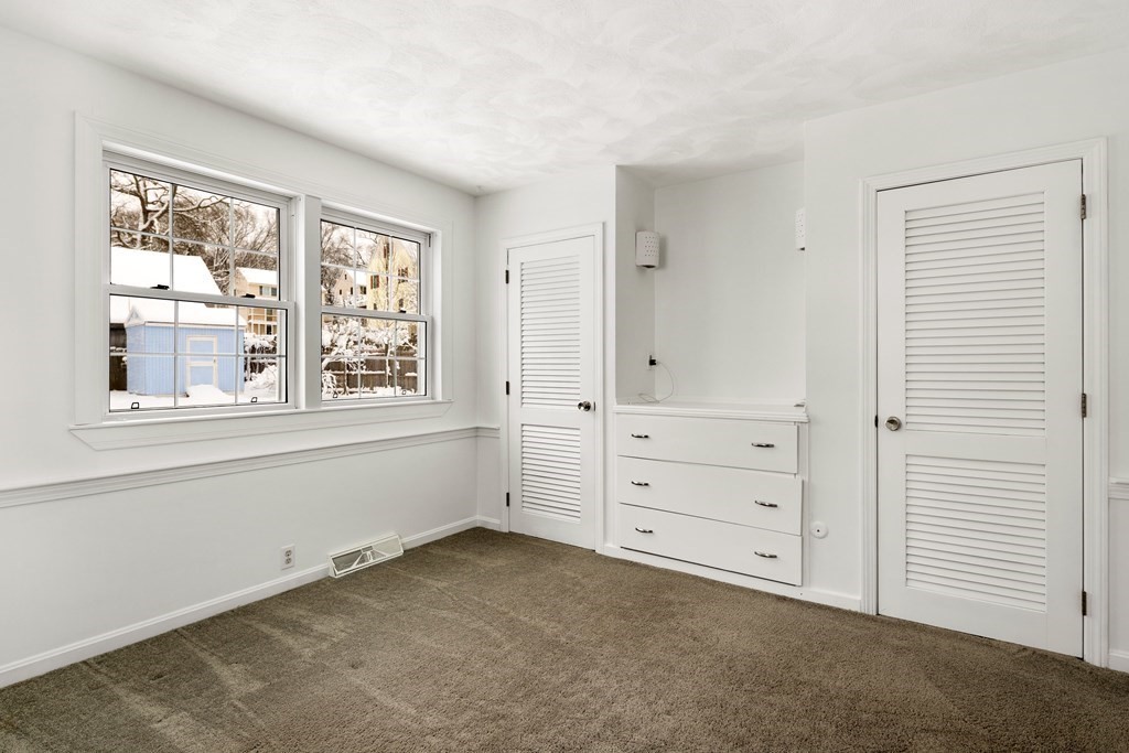 9 Fuller Road Billerica, MA 01821 - Photo 20 of 27 a view of an empty room with a window