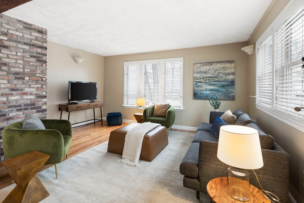 9 Fuller Road Billerica, MA 01821 - Photo 8 of 27 a spacious bedroom with a bed and glass window