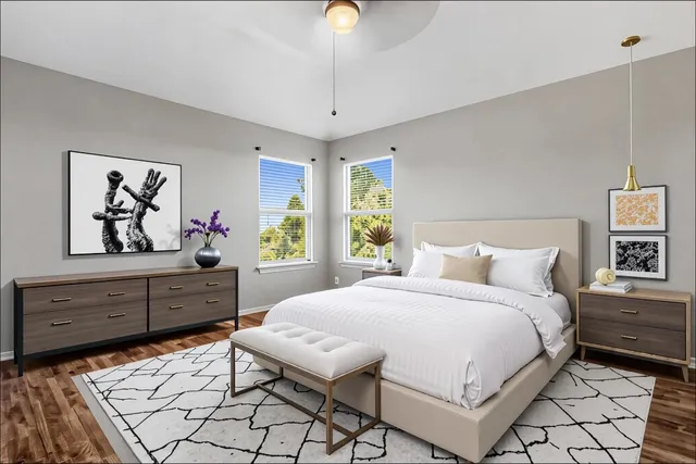 a bedroom with a bed and a dresser