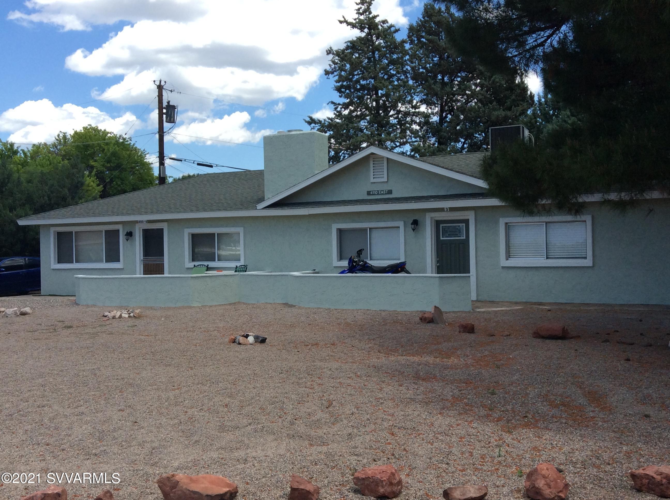 4110 East Valley Lane Rimrock, AZ 86335 - Photo 1 of 8 a front view of a house with a yard