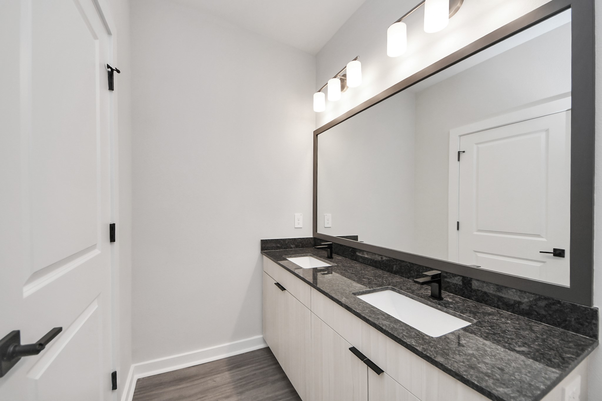 7711 Longmire Road, Unit 5 Conroe, TX 77304 - Photo 15 of 48 Primary Suite offers walk-closet,bath w/dual vanities&lux tub/shower.