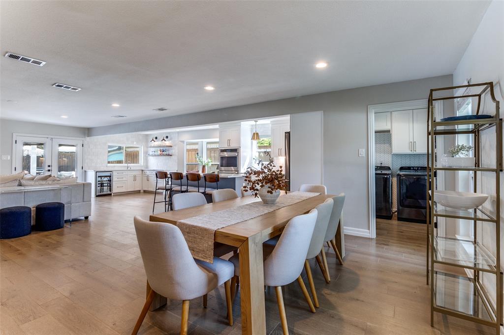 9243 Moss Farm Lane Dallas, TX 75243 - Photo 7 of 37 a view of a dining room with furniture