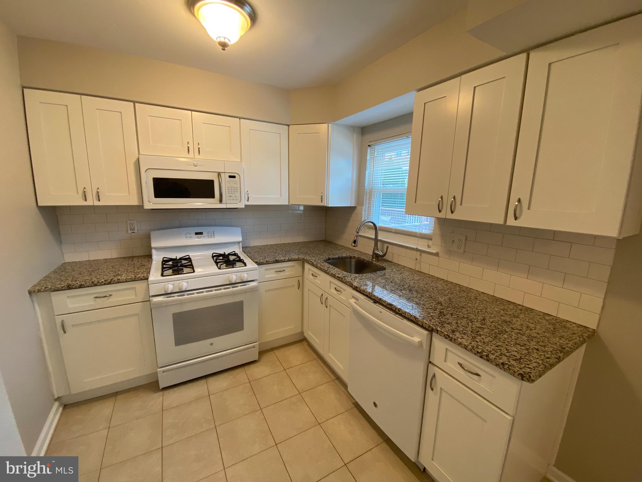 3984 Constance Road Philadelphia, PA 19114 - Photo 8 of 29 Remodeled custom kitchen with granite counters