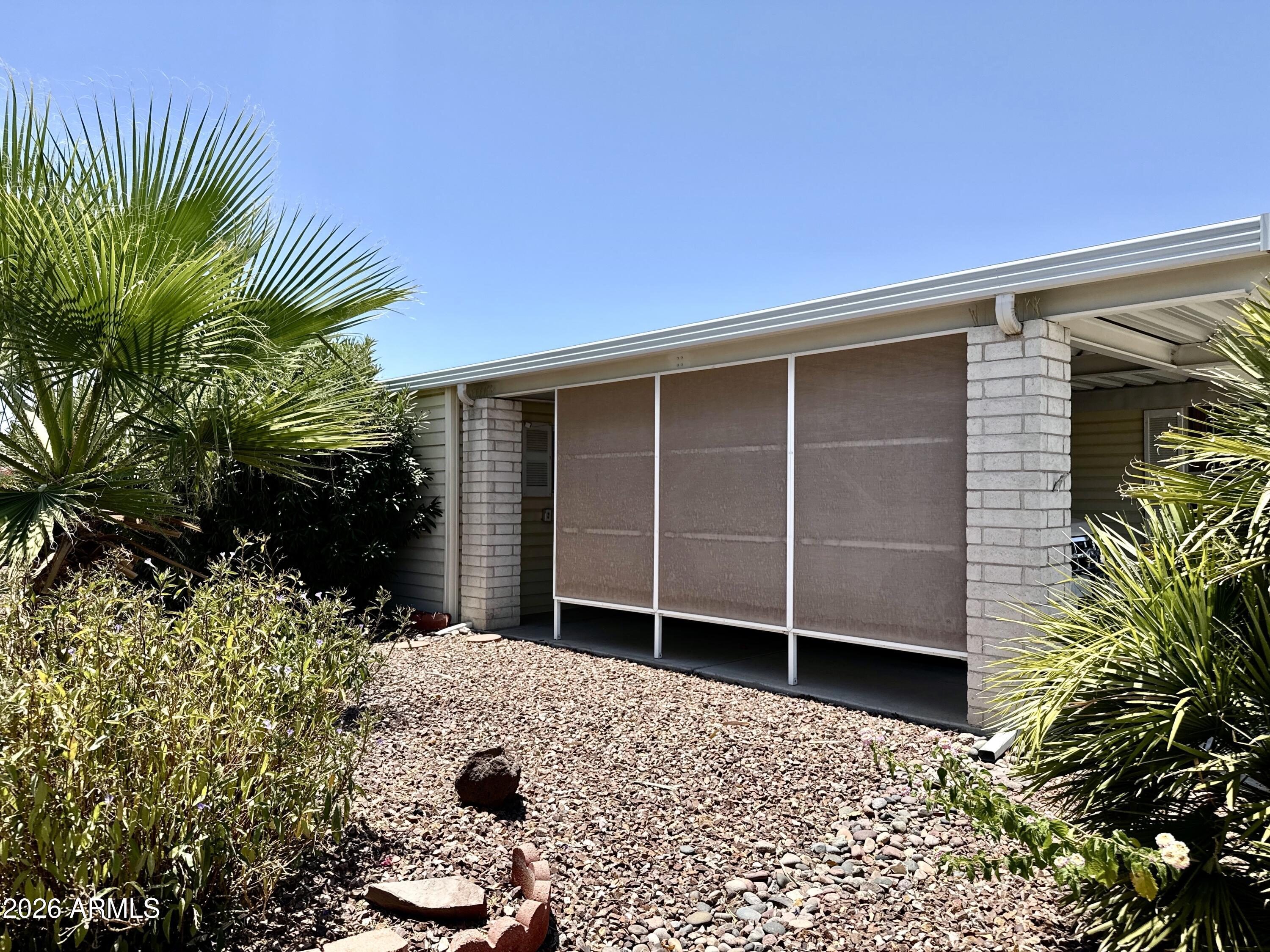 2550 South Ellsworth Road, Unit 208 Mesa, AZ 85209 - Photo 39 of 44 Privacy shades on carport