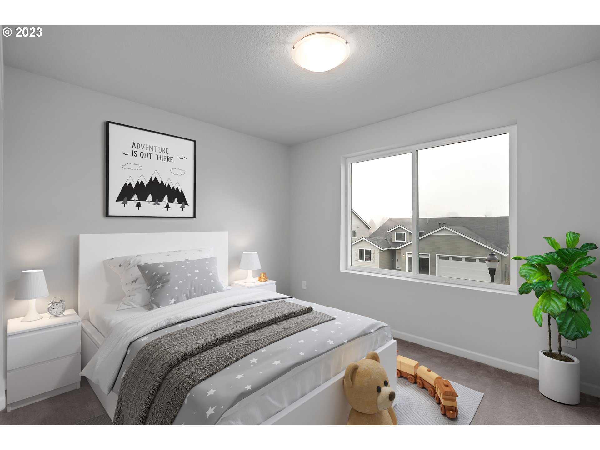 2632 South 8th Way Ridgefield, WA 98642 - Photo 13 of 28 a bedroom with a bed and a potted plant