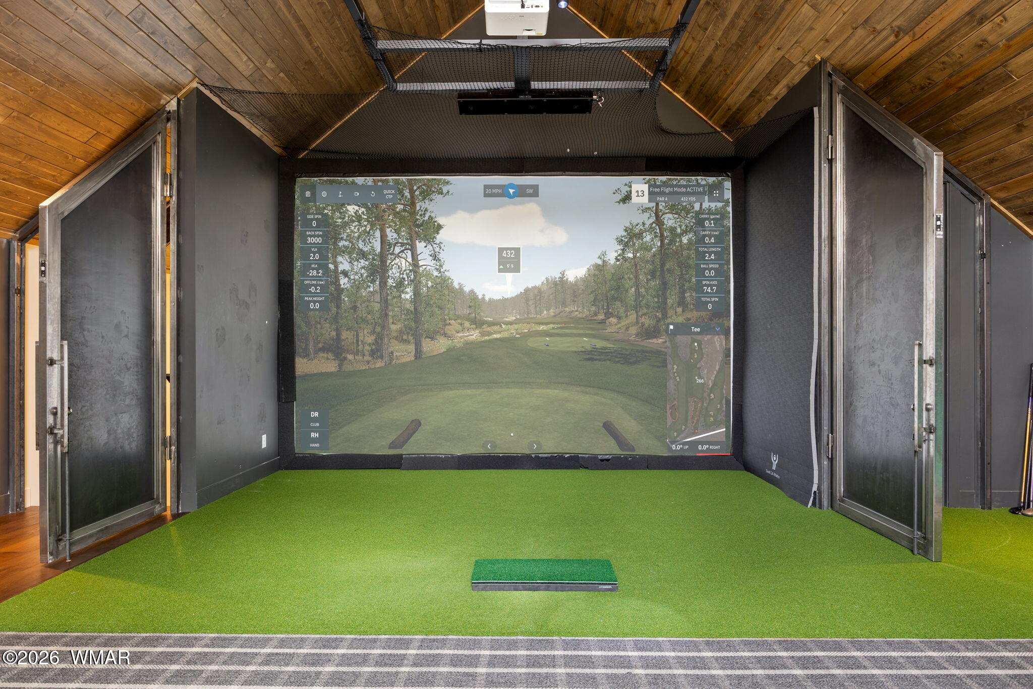 2441 South Monkshood Road Show Low, AZ 85901 - Photo 64 of 90 East Wing Bonus Room Golf simulator