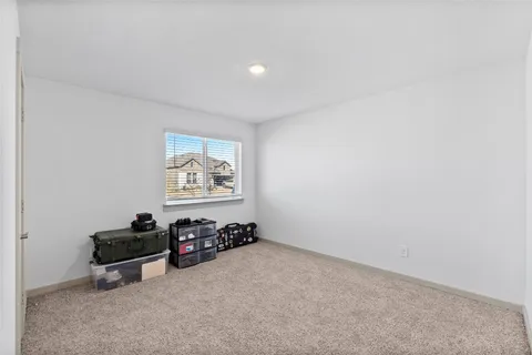 a bathroom with a toilet sink and shower