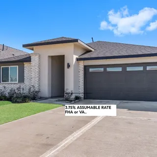 a bathroom with a double vanity sink a mirror and shower