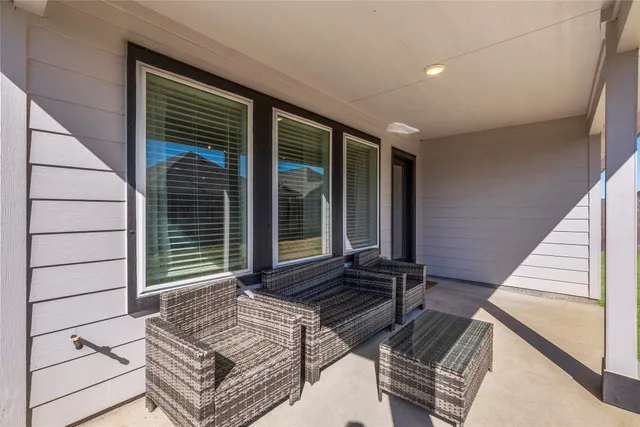 a view of house with stairs and wooden floor