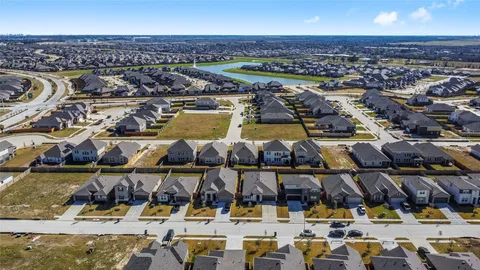 an aerial view of a house with outdoor space