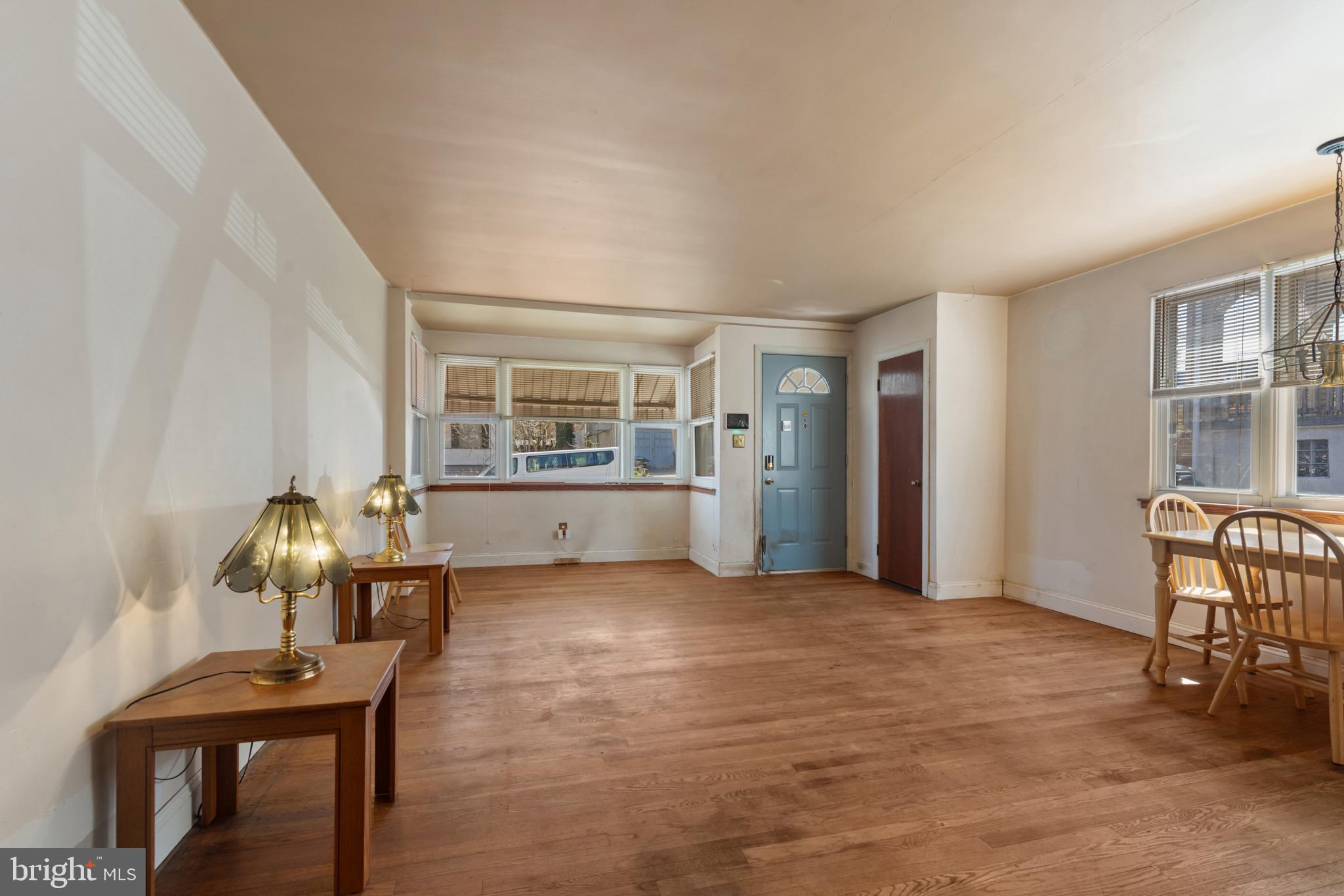 5016 Morello Road Baltimore, MD 21214 - Photo 4 of 16 a view of a livingroom with furniture and windows