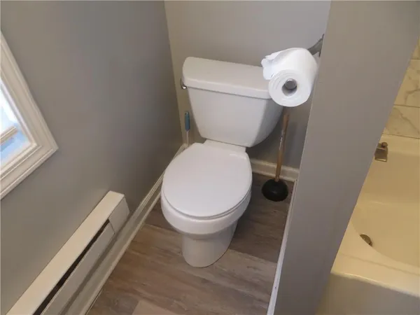 a close view of a toilet in a bathroom