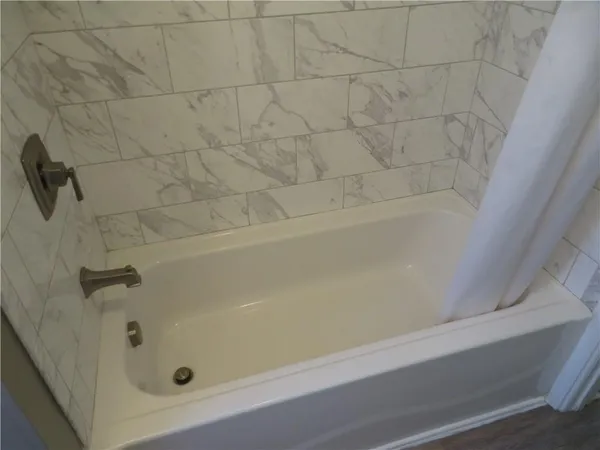 a bathroom with a bathtub