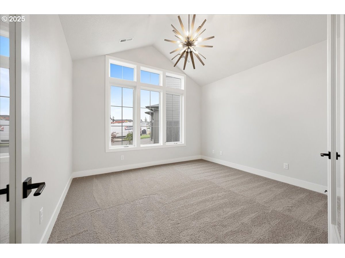 3517 North 11th Circle Ridgefield, WA 98642 - Photo 25 of 44 a view of an empty room with a window