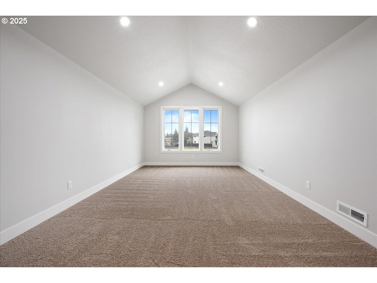 3517 North 11th Circle Ridgefield, WA 98642 - Photo 29 of 44 a view of an empty room and a window