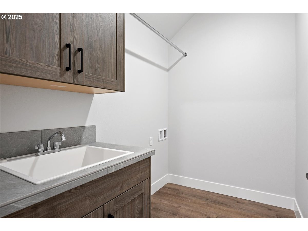 3517 North 11th Circle Ridgefield, WA 98642 - Photo 34 of 44 a bathroom with a sink and a mirror