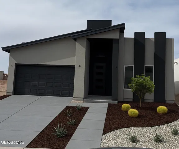 a living room with furniture kitchen and a chandelier