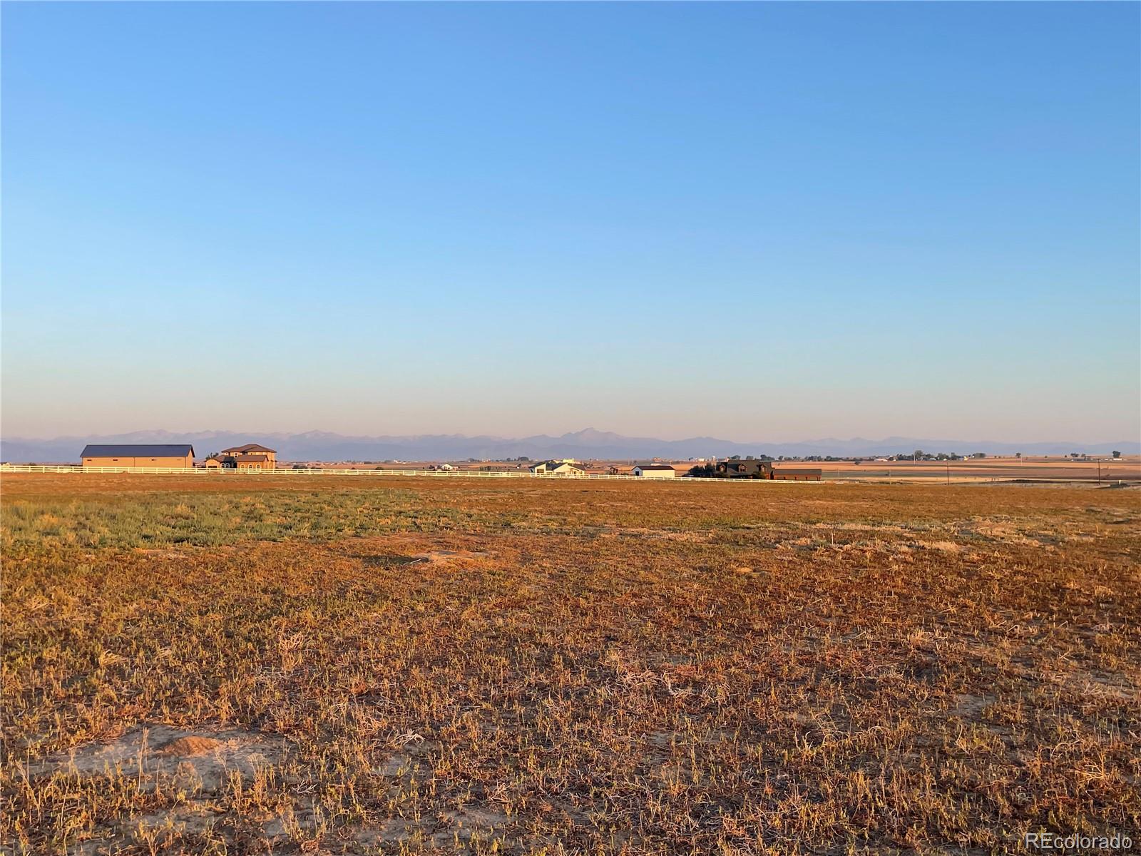 4 County Road Brighton, CO 80603 - Photo 5 of 6 an aerial view of ocean and residential houses with outdoor space