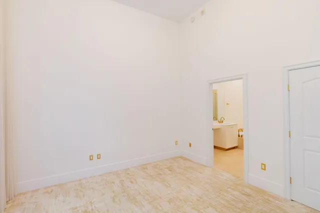 a utility room with sink dryer and washer
