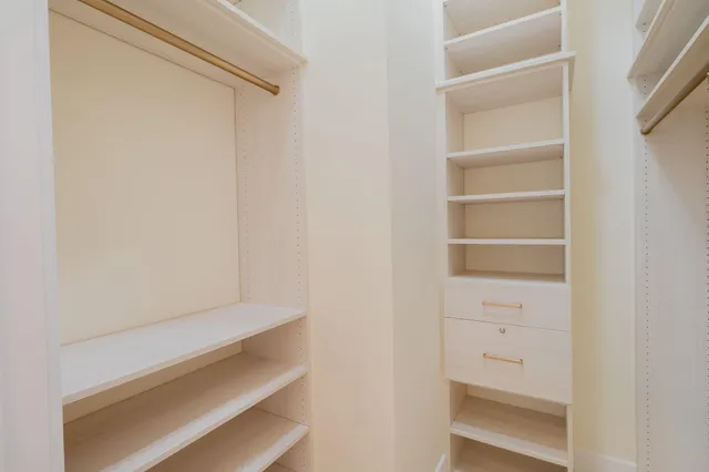 a view of a swimming pool with a lounge chairs