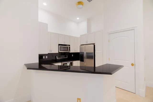 a view of city with ocean