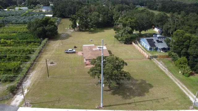 a view of a lake with a yard