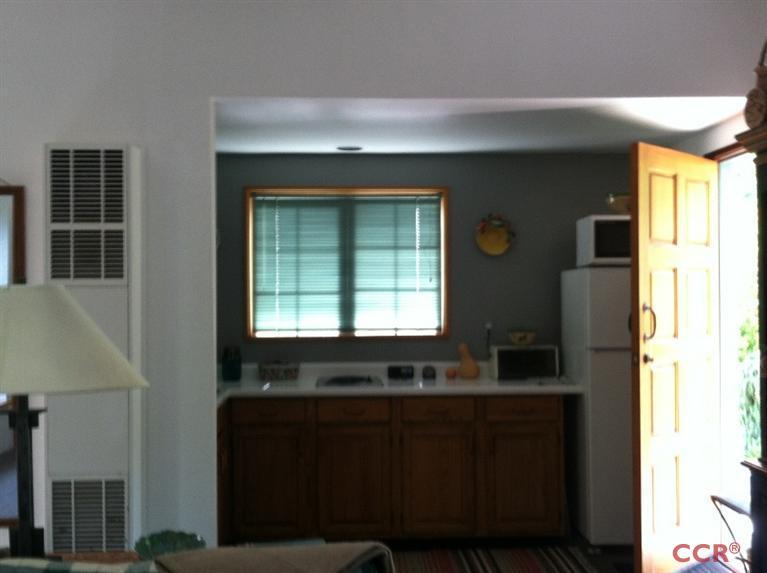 1569 Sycamore Canyon Road Santa Barbara, CA 93108 - Photo 16 of 25 a bathroom with a sink and a mirror