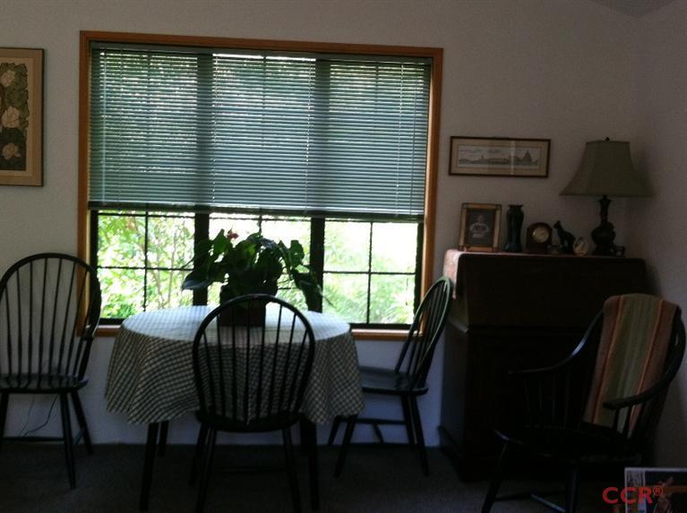 1569 Sycamore Canyon Road Santa Barbara, CA 93108 - Photo 17 of 25 a view of a dining room with furniture window and outside view