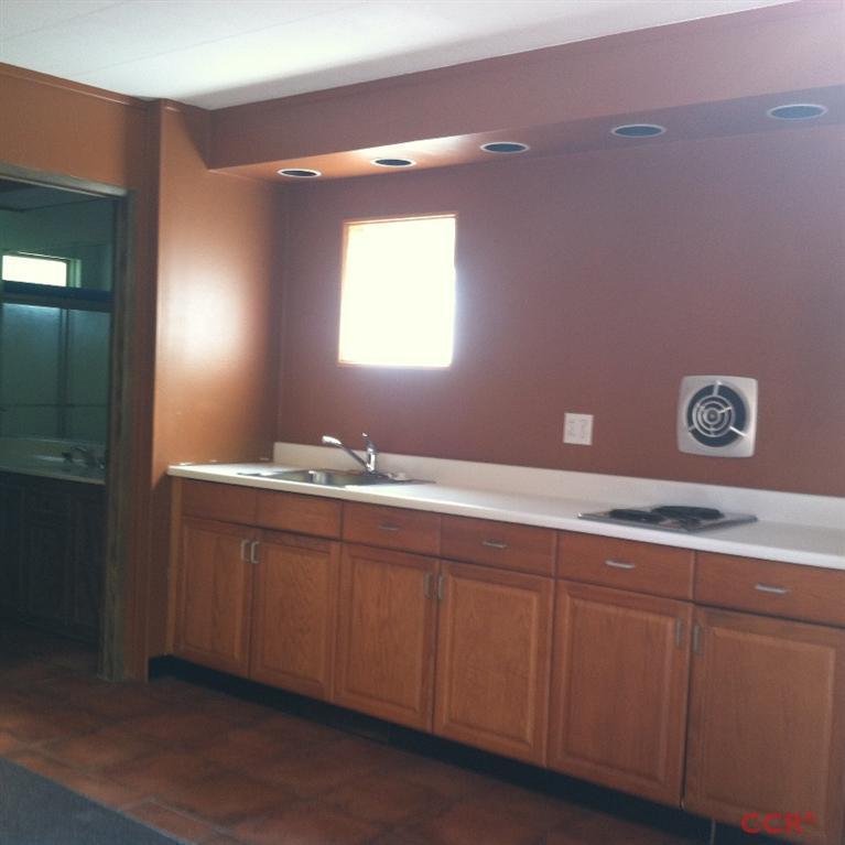 1569 Sycamore Canyon Road Santa Barbara, CA 93108 - Photo 21 of 25 a bathroom with a sink and a mirror