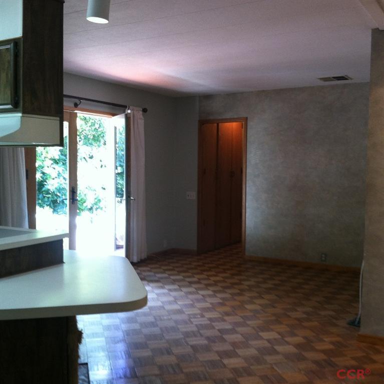 1569 Sycamore Canyon Road Santa Barbara, CA 93108 - Photo 8 of 25 wooden floor in an empty room with a window