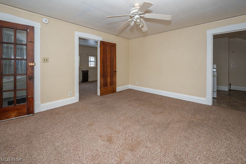 3114 Neosho Road Youngstown, OH 44511 - Photo 12 of 25 Spare room with carpet and a ceiling fan