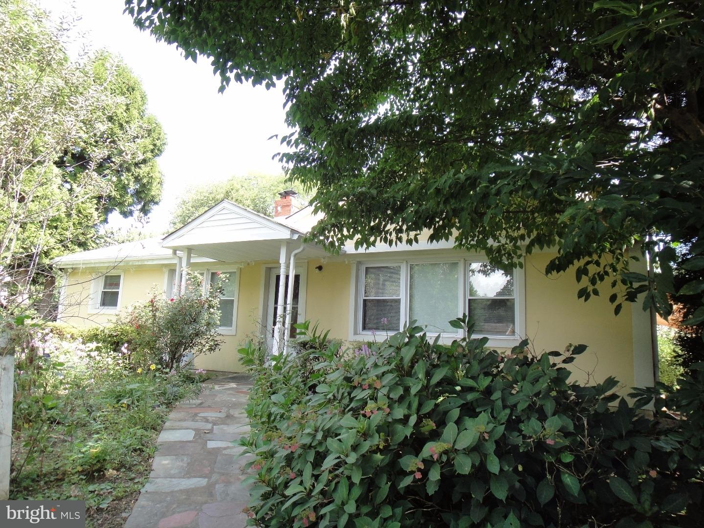 823 Suffolk Road Jenkintown, PA 19046 - Photo 1 of 19 a front view of a house with a yard