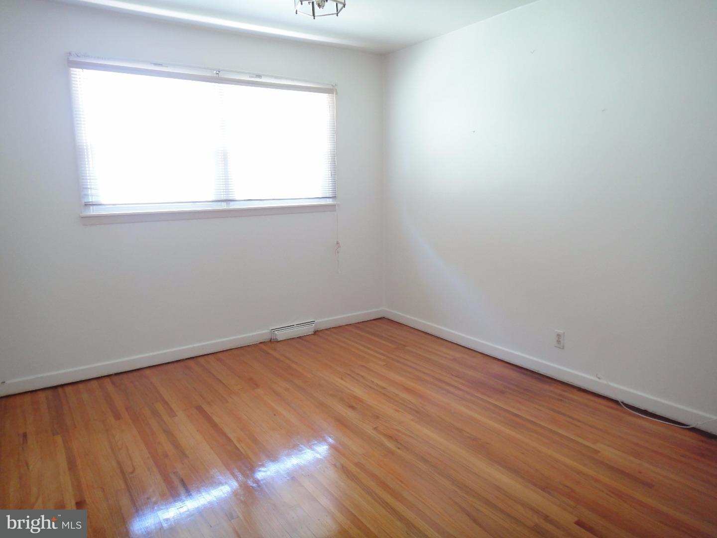 823 Suffolk Road Jenkintown, PA 19046 - Photo 13 of 19 an empty room with a window
