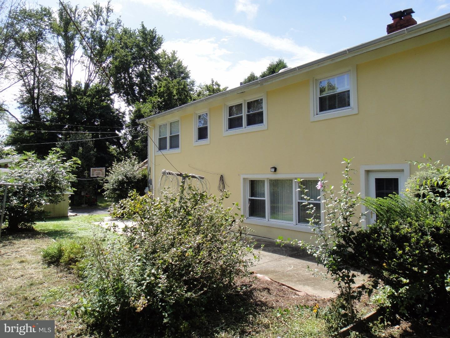 823 Suffolk Road Jenkintown, PA 19046 - Photo 16 of 19 a front view of a house with a yard