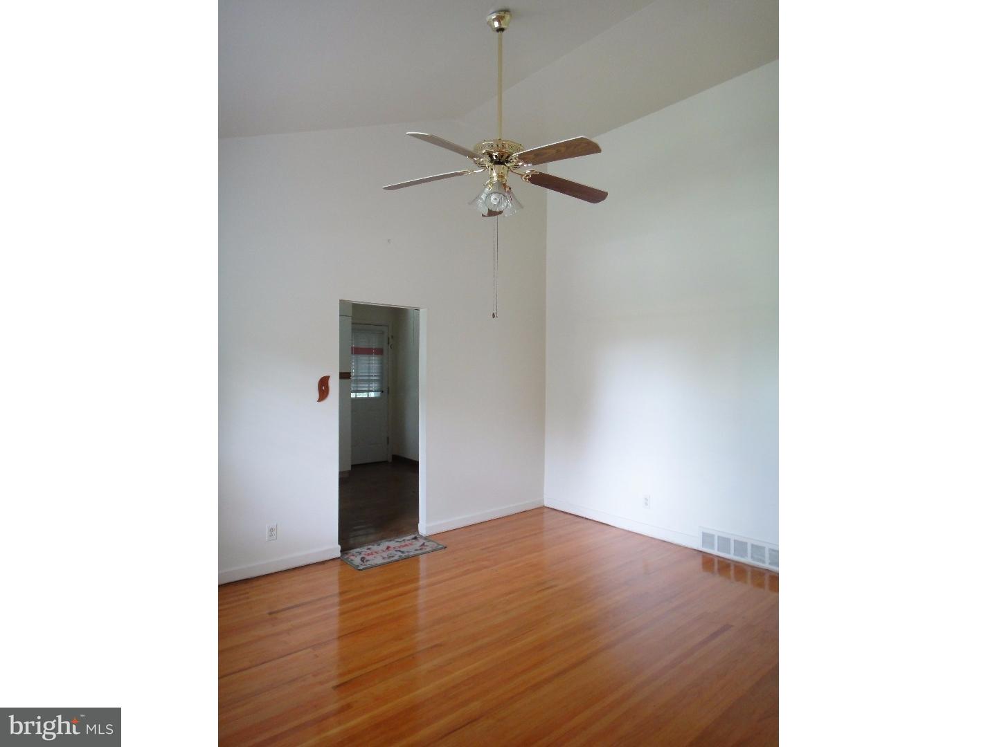823 Suffolk Road Jenkintown, PA 19046 - Photo 6 of 19 a view of a hallway with wooden floor