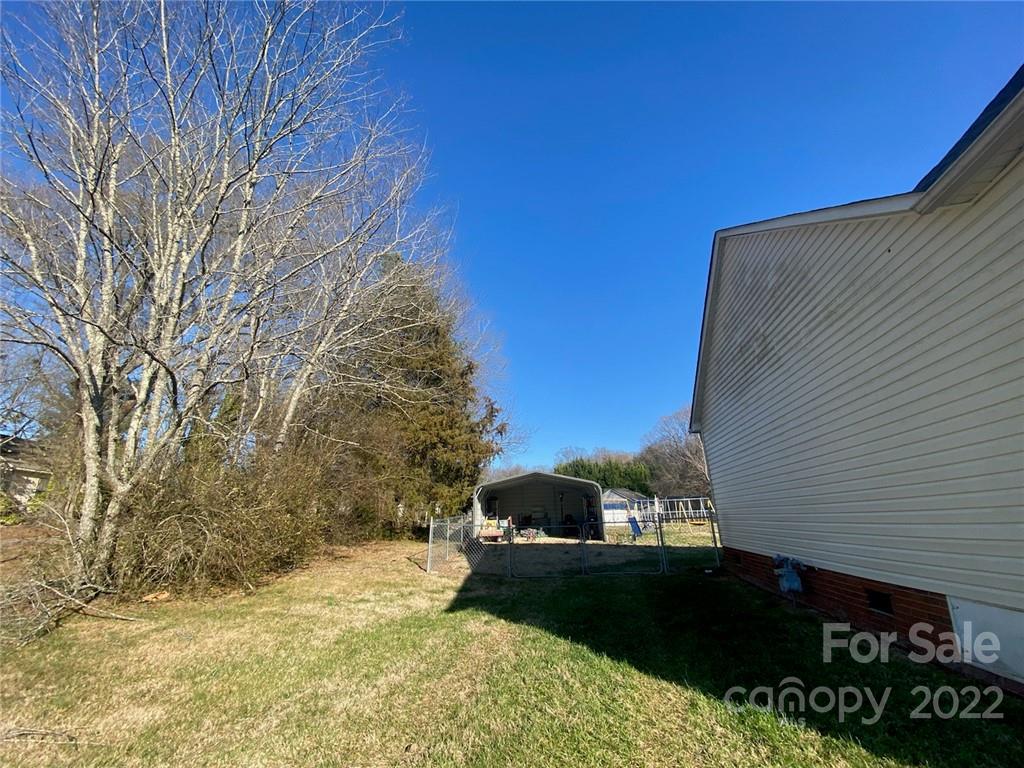 104 Dameron Road Bessemer City, NC 28016 - Photo 11 of 15 a view of a backyard of the house