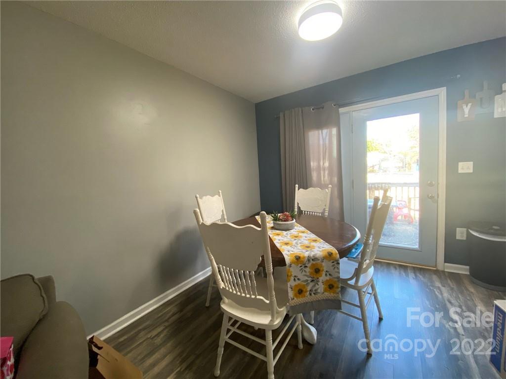 104 Dameron Road Bessemer City, NC 28016 - Photo 4 of 15 a view of a dining room with furniture and wooden floor