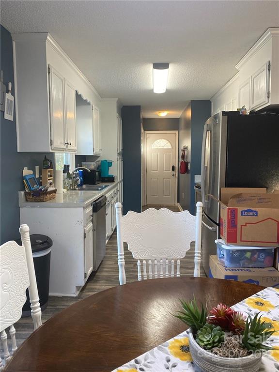 104 Dameron Road Bessemer City, NC 28016 - Photo 5 of 15 a kitchen with stainless steel appliances granite countertop a refrigerator sink and stove