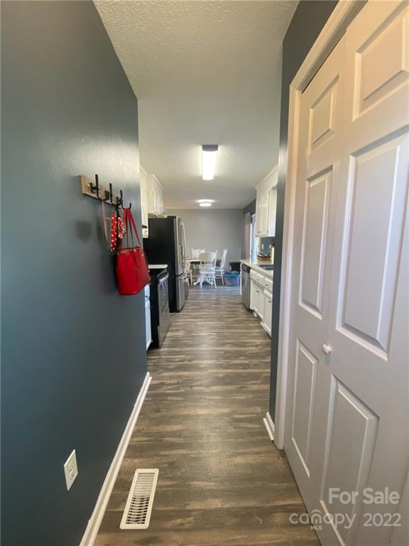 104 Dameron Road Bessemer City, NC 28016 - Photo 6 of 15 a view of a hallway with a dining room