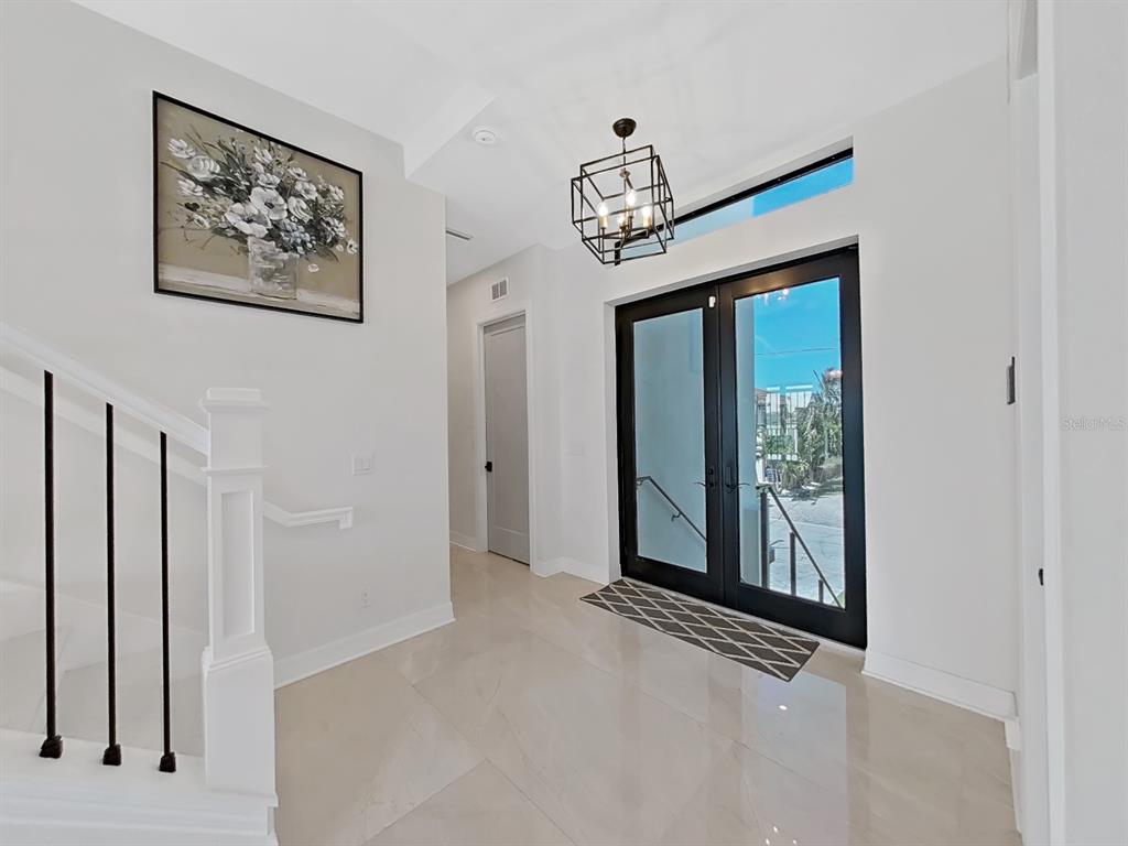 882 Bay Point Drive Madeira Beach, FL 33708 - Photo 49 of 73 a view of a hallway with interior of the house