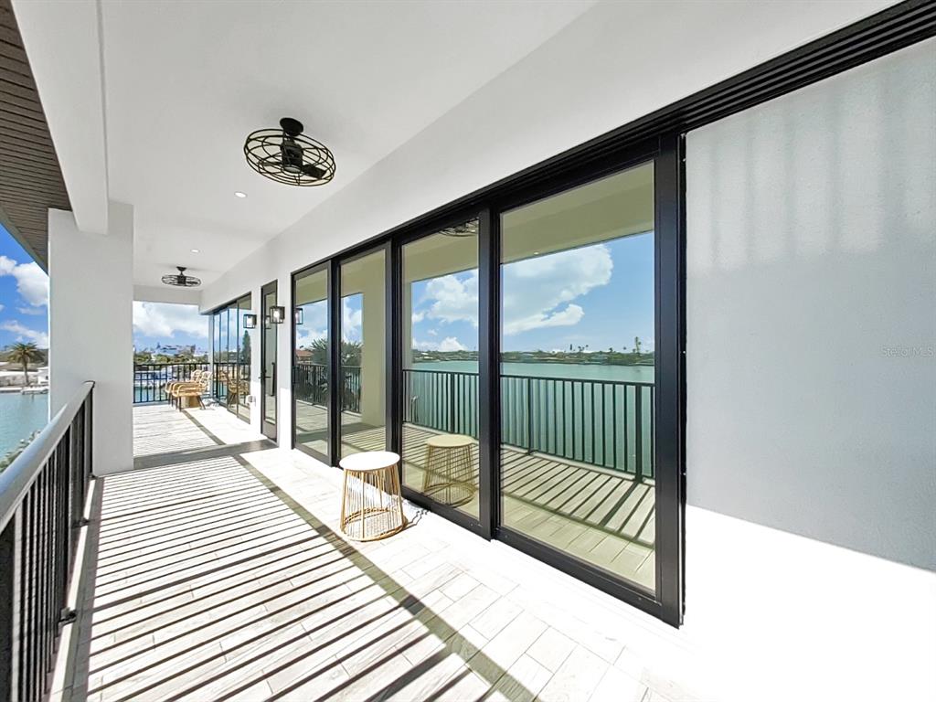 882 Bay Point Drive Madeira Beach, FL 33708 - Photo 62 of 73 a view of a balcony