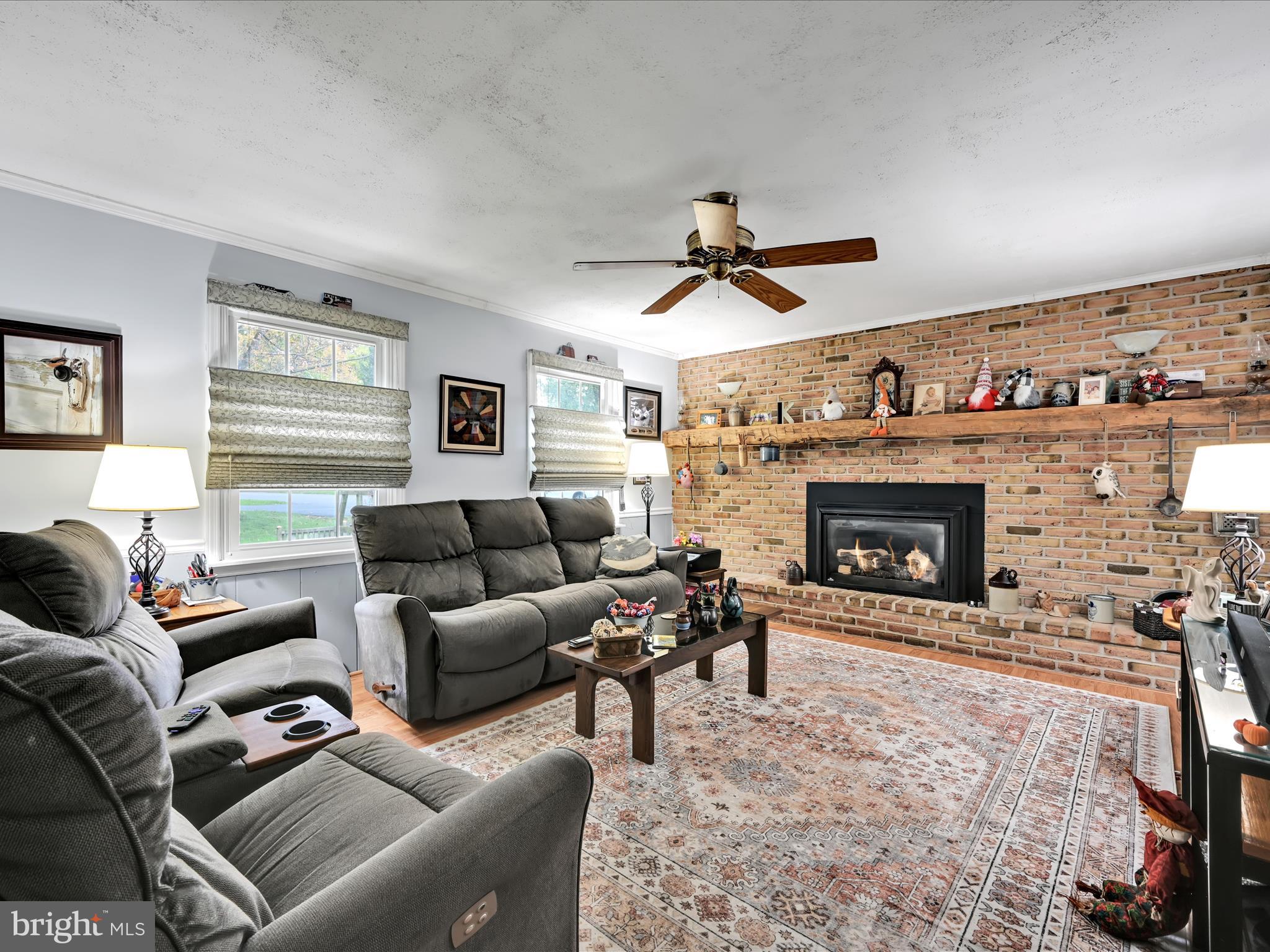 618 West 3rd Avenue Lititz, PA 17543 - Photo 14 of 40 a living room with furniture and a fireplace