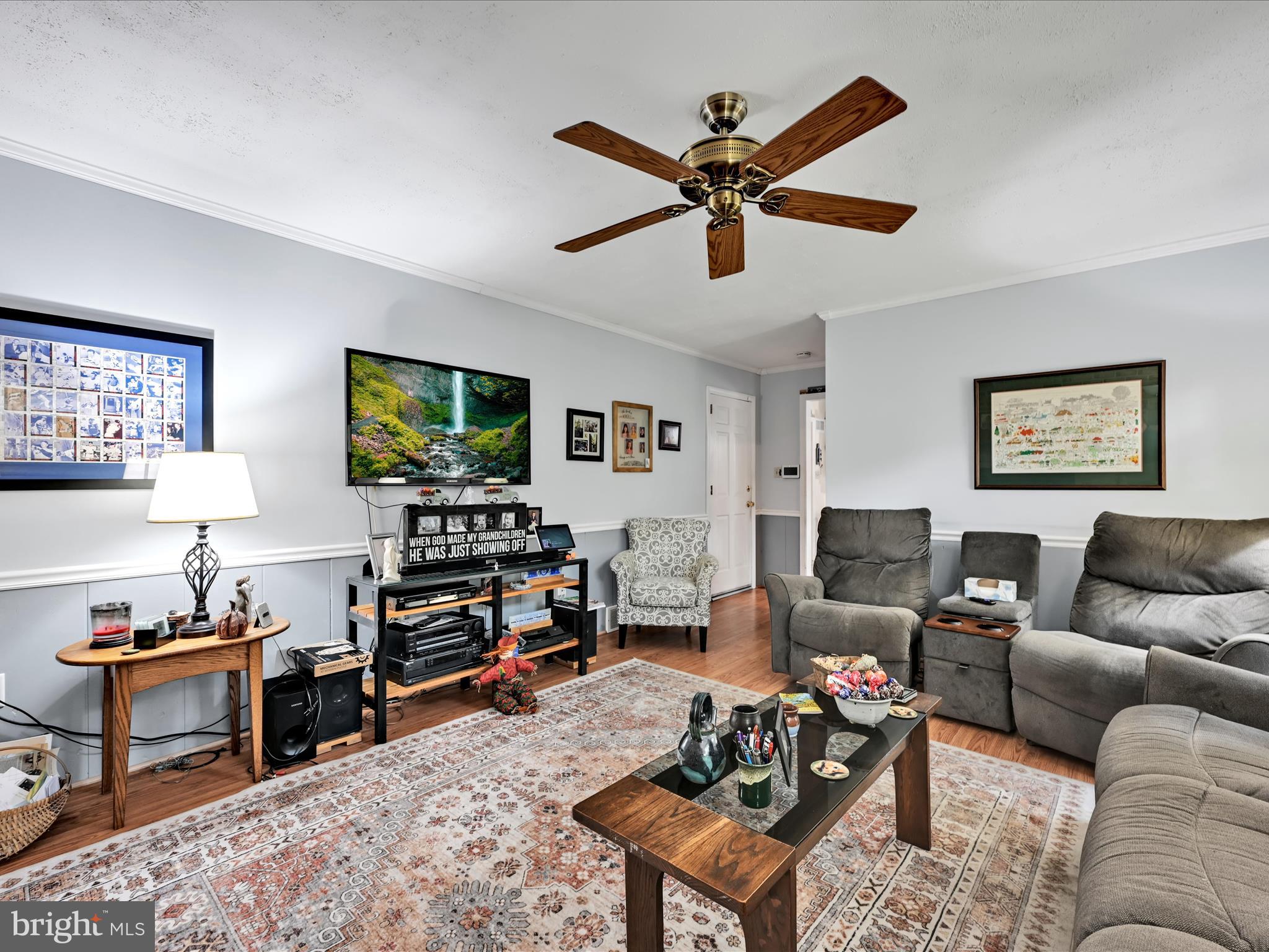618 West 3rd Avenue Lititz, PA 17543 - Photo 15 of 40 a living room with furniture a flat screen tv and a window
