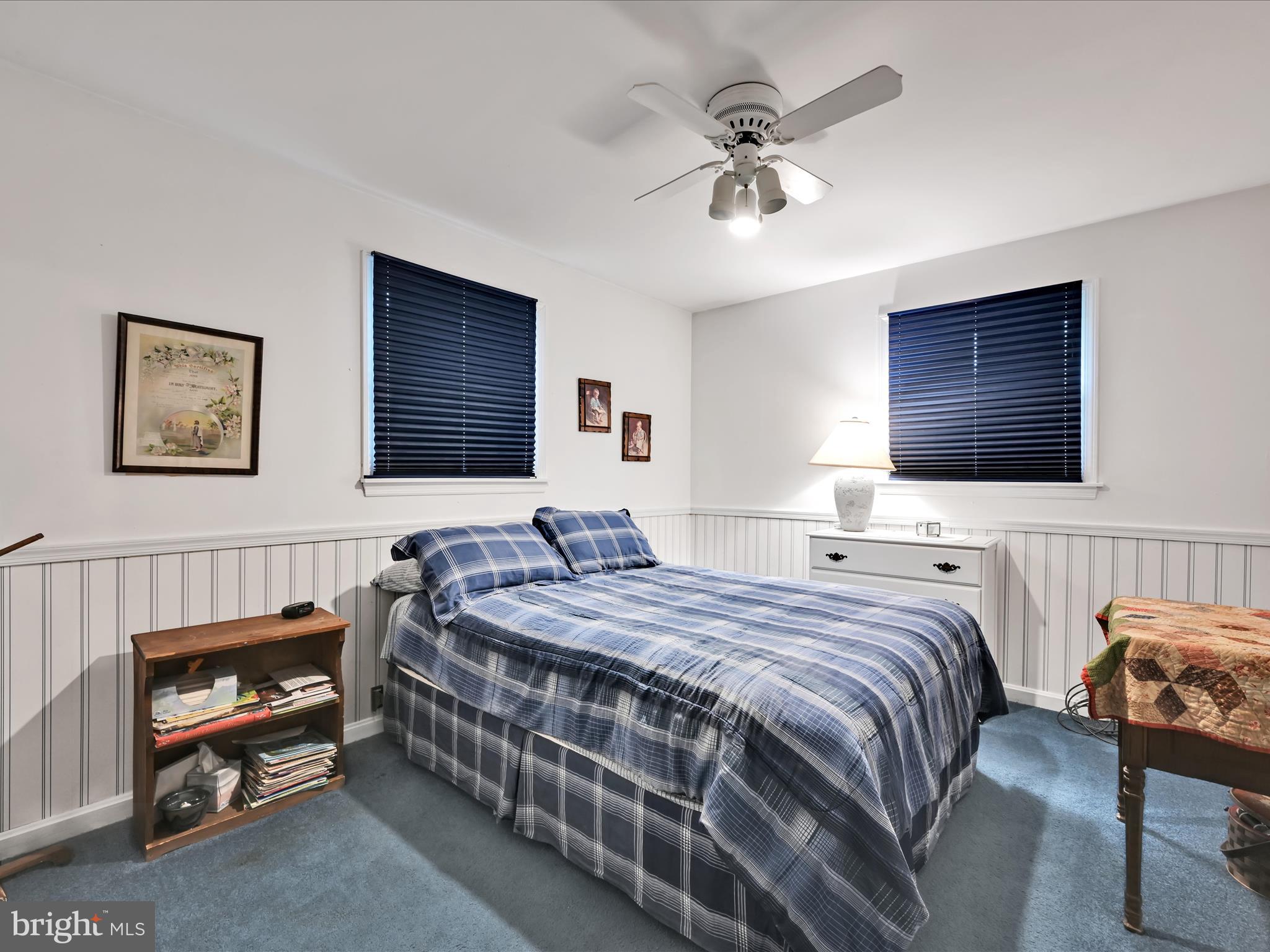 618 West 3rd Avenue Lititz, PA 17543 - Photo 19 of 40 a bedroom with a bed and a chandelier