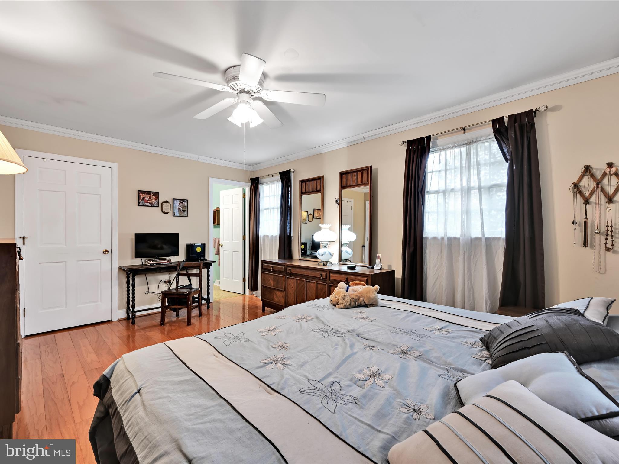 618 West 3rd Avenue Lititz, PA 17543 - Photo 23 of 40 a bedroom with a bed and a large window with wooden floor