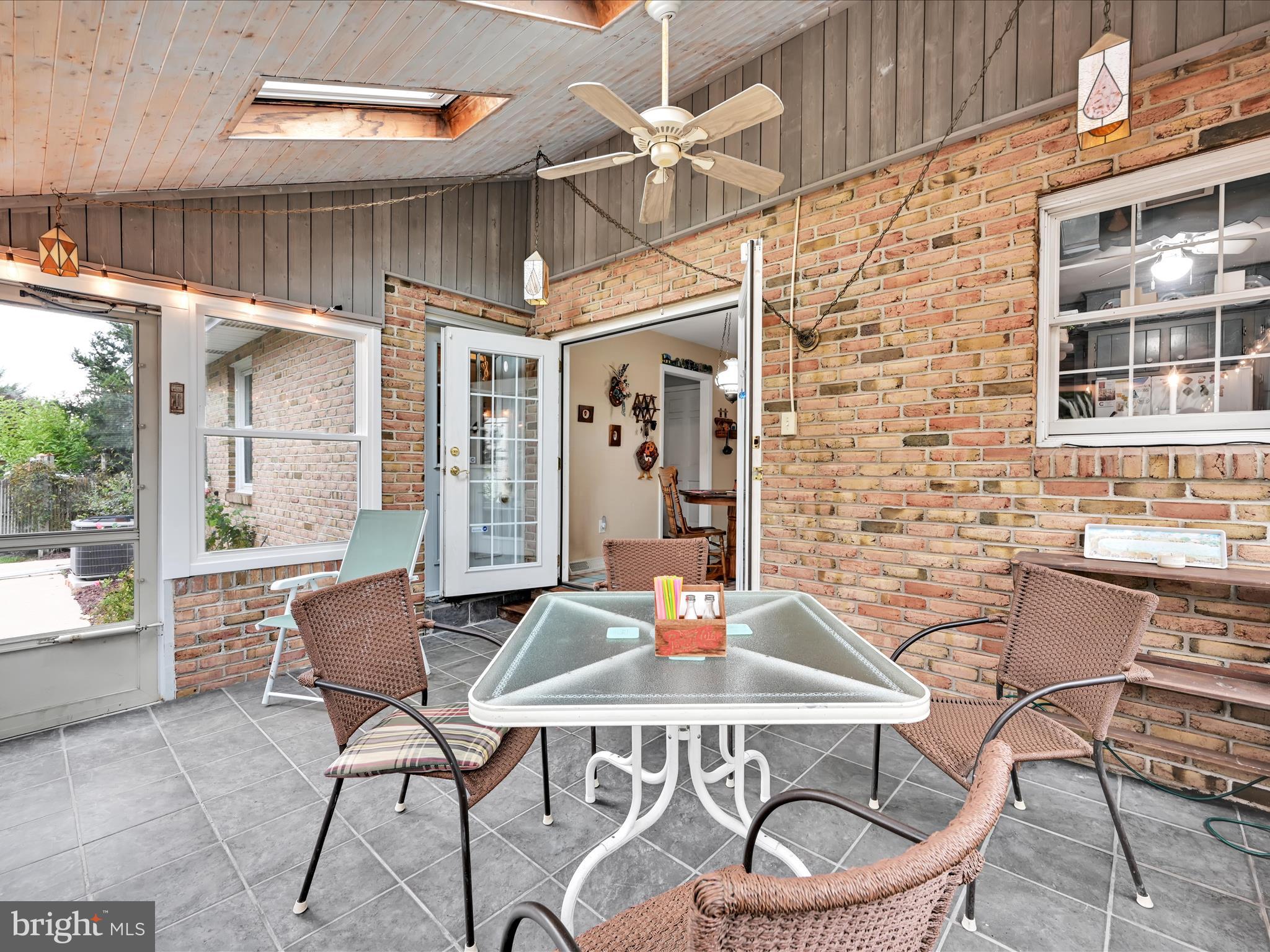 618 West 3rd Avenue Lititz, PA 17543 - Photo 29 of 40 a outdoor dining space with furniture and chandelier