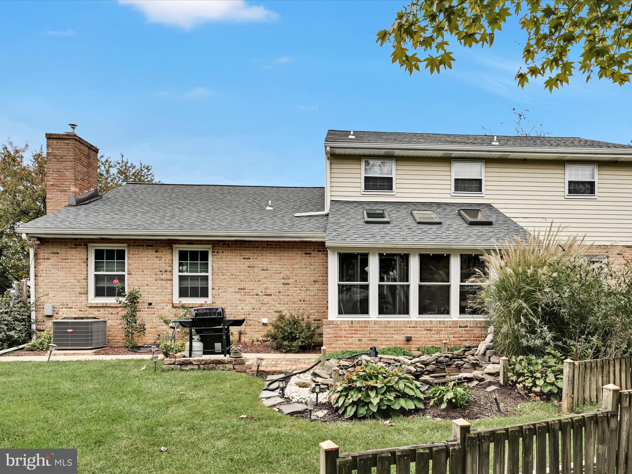 618 West 3rd Avenue Lititz, PA 17543 - Photo 34 of 40 a front view of a house with a garden